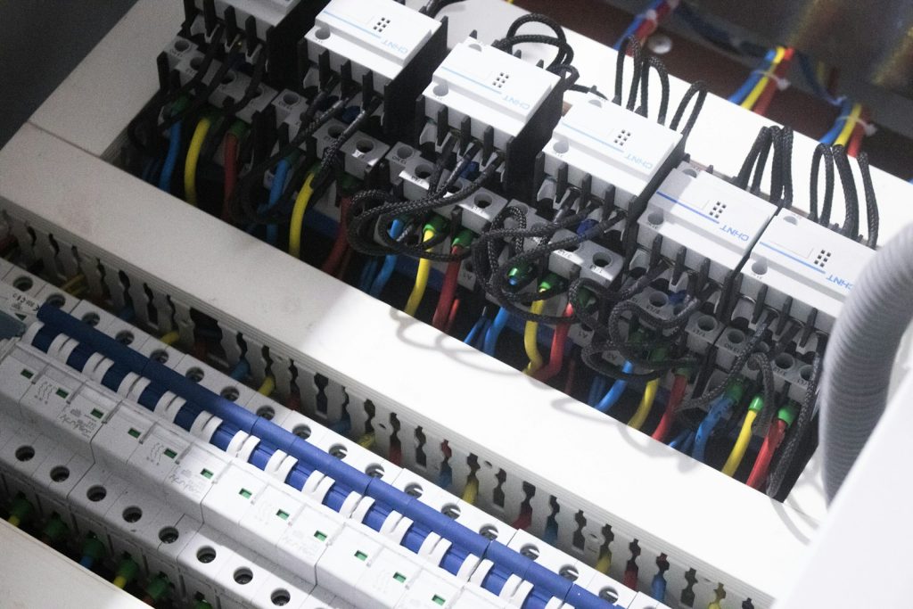 Wired switchgear modules and terminals inside an electrical cabinet